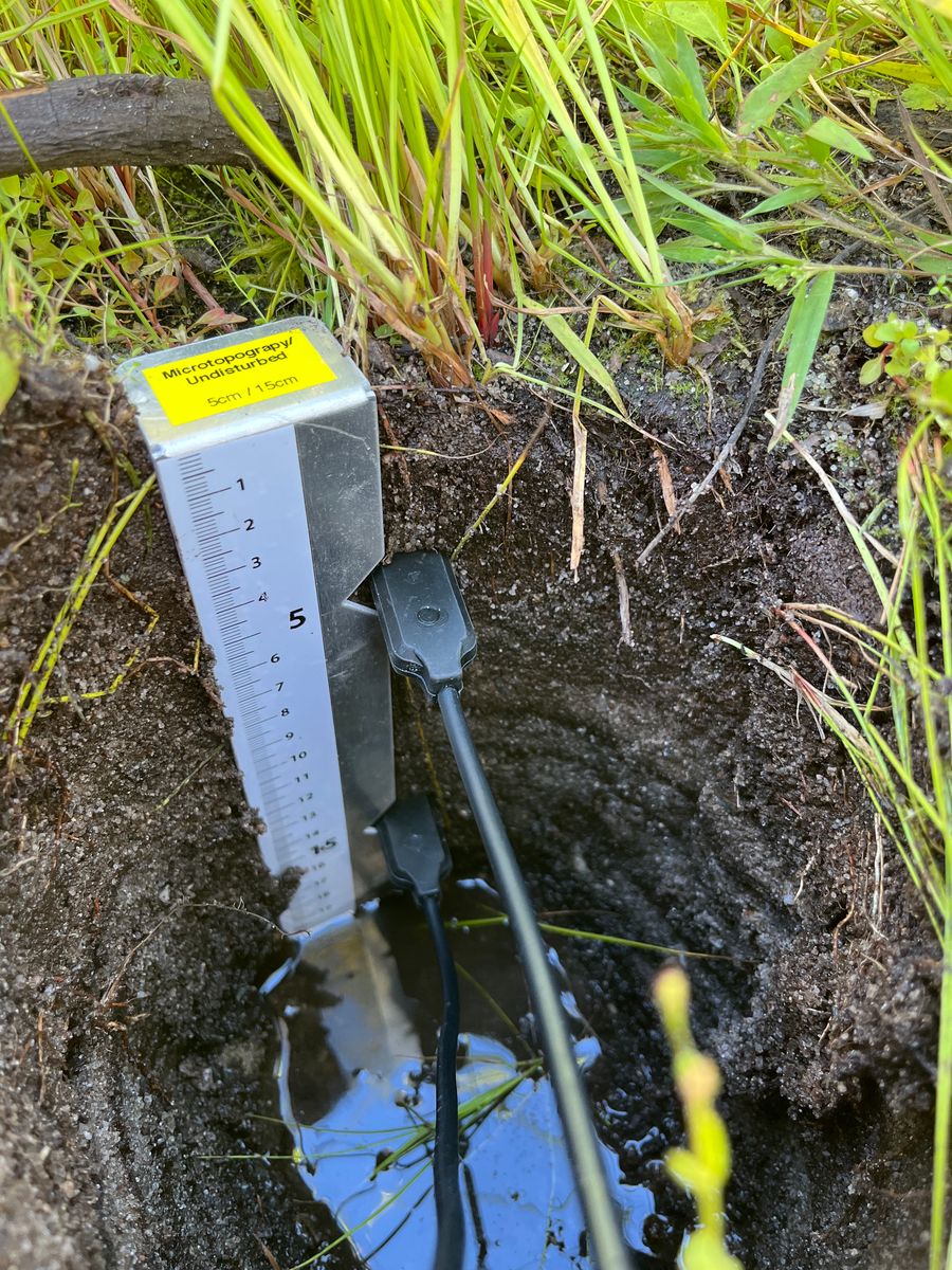 Classic layer cake soil provide visible during soil moisture probe installation
