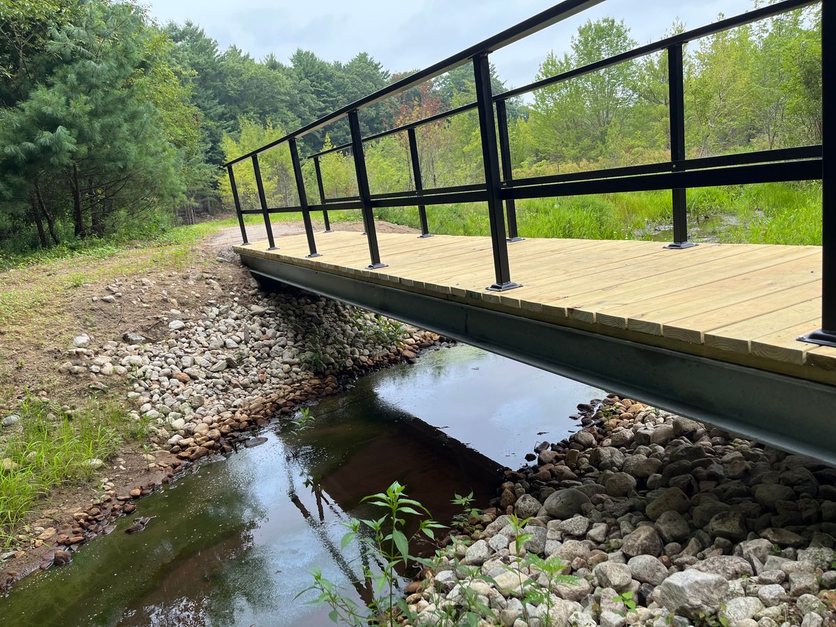 Bridge installed where a culvert was removed at Sampons Brook Headwaters restoration Project. 